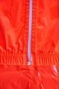 milremo veste coupe vent légère réspirante et déperlante basic orange fluo running cyclisme matière polyamide 